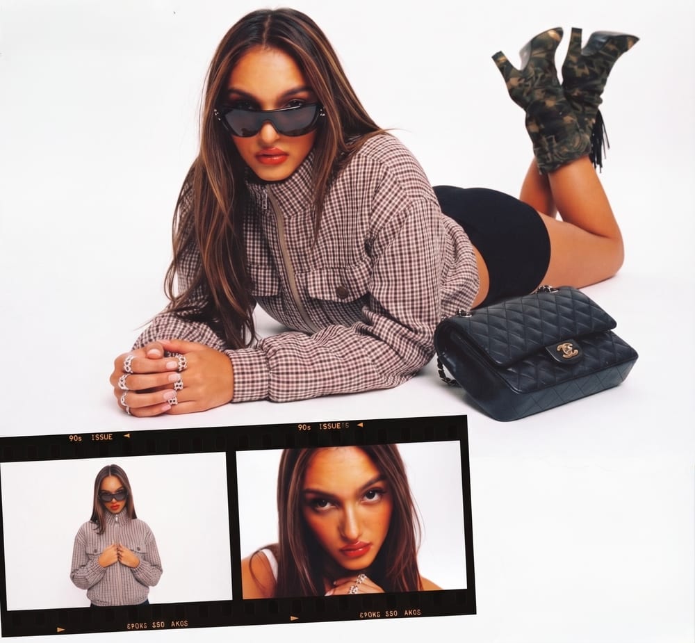 The Harlow Jacket with black shorts and camo boots, lying on the studio floor, above a film strip of two more frames